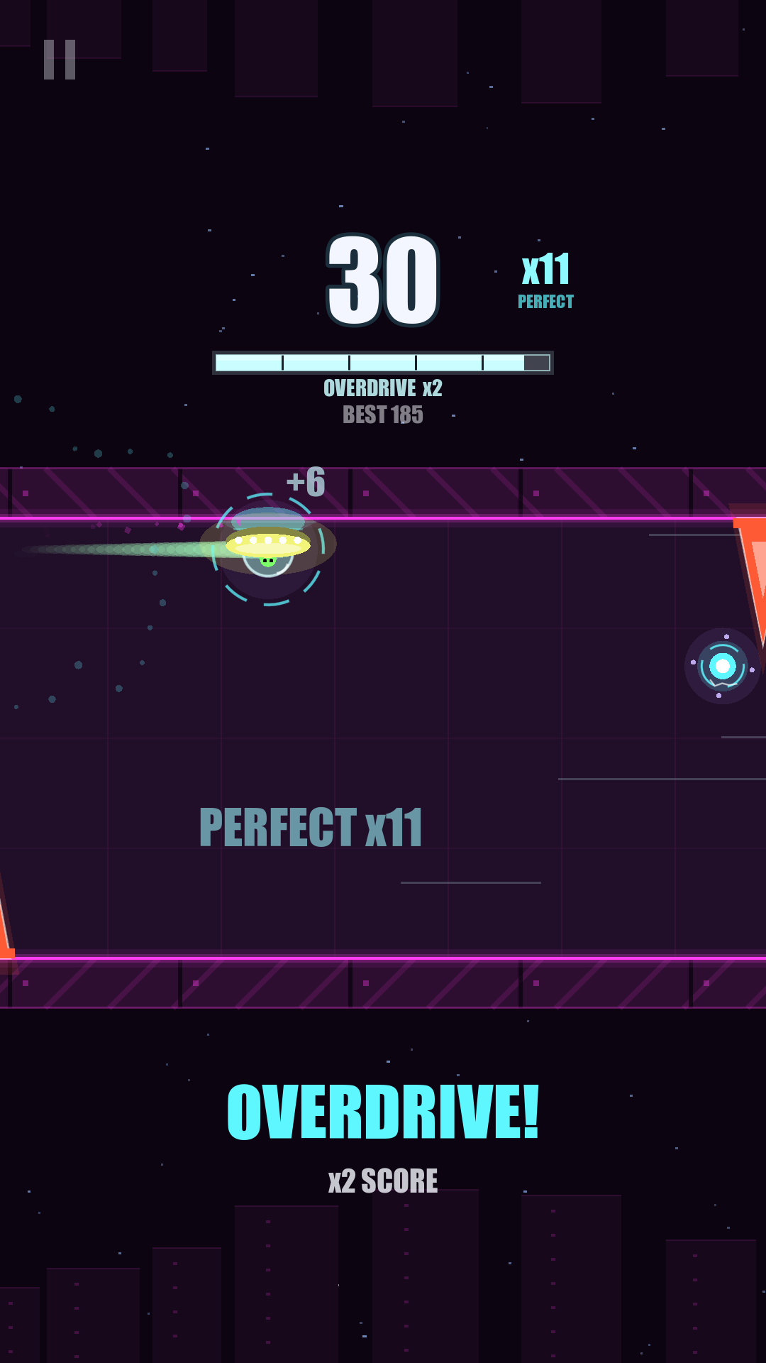 FLIP gameplay: the UFO races along the ceiling with OVERDRIVE active, showing a x2 score and an 11-hit PERFECT streak.